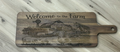 XL paddle charcuterie board engraved with Welcome to the Farm, a barn, windmill, vintage truck, and farm animals
