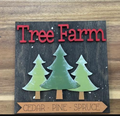 Tree Farm finished insert with red lettering, three green trees, snowy dark background, and Cedar Pine Spruce banner.