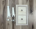 Unfinished double wood frame with scalloped border, two stands, and small assembly pieces