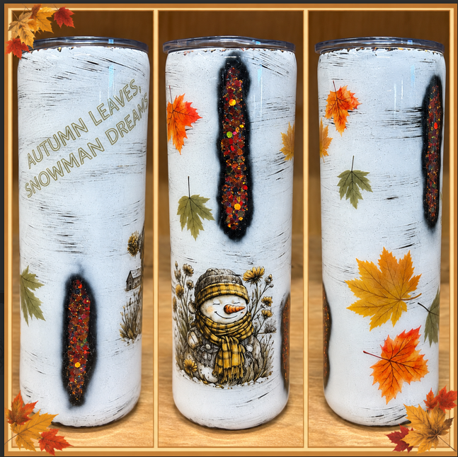 White 20oz skinny epoxy tumbler with autumn leaves, a bundled snowman, and Autumn Leaves Snowman Dreams design