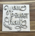 Unfinished Home Sweet Home birch frame insert with script lettering, a small heart, and a leafy accent.