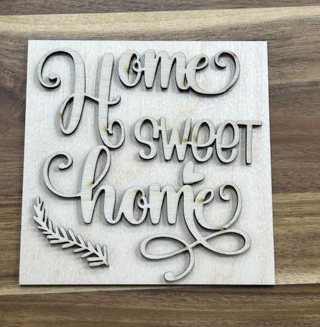 Unfinished Home Sweet Home birch frame insert with script lettering, a small heart, and a leafy accent.