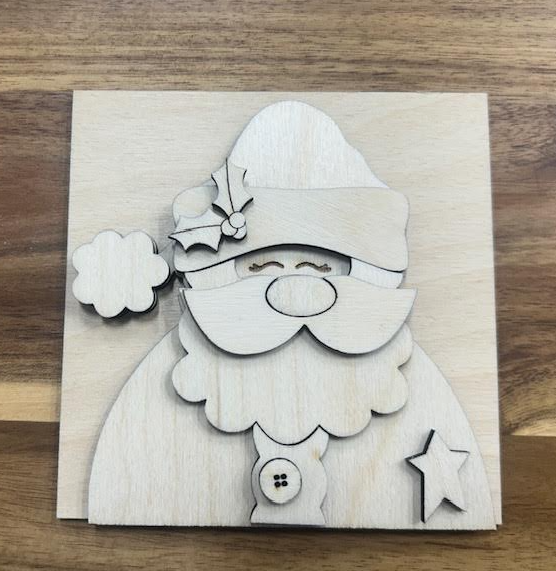 Unfinished Santa frame insert wood blank with a hat, holly, mustache, beard, button, and star