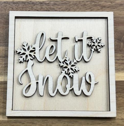 Unfinished Let It Snow wood insert with script lettering and three snowflakes displayed in a square frame