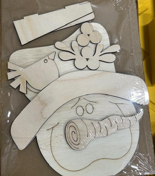 Unfinished snowman head shelf sitter wood blank with carrot nose, decorated hat, and stand pieces