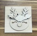 Unfinished reindeer frame insert wood blank with antlers, holly, closed eyes, and a round nose