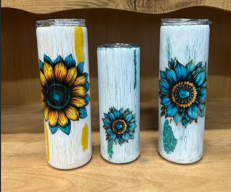 White 30oz skinny epoxy tumbler with yellow and teal sunflower artwork