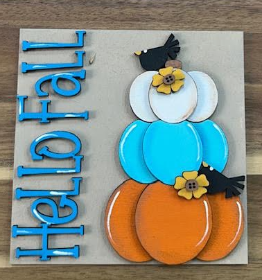 Hello Fall finished insert with cream, turquoise, and orange stacked pumpkins, black birds, and yellow flowers