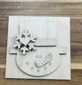 Unfinished snowman frame insert wood blank with a top hat, snowflake, heart, and carrot nose